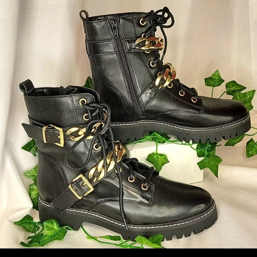 Carvela. Salute. Black boots with gold trim and chain. Size 7.5.   NWOT
